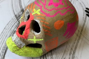 Colourful neon patterned clay skull