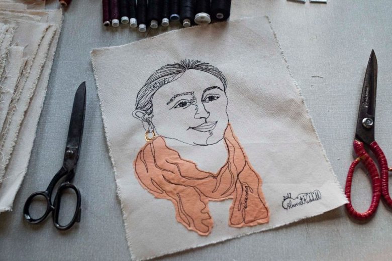Stitched self portrait of a lady wearing a scarf