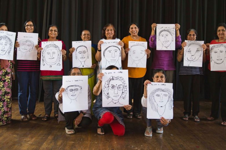 Anand Mangal ladies holding up their stitched self portraits