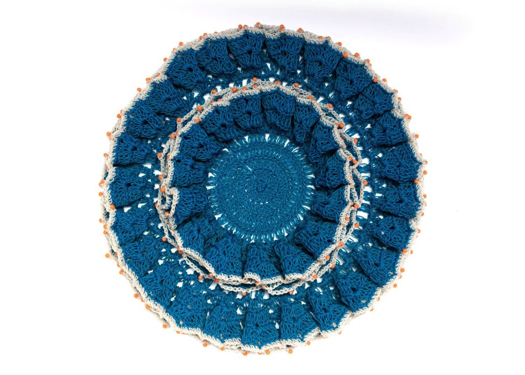 Blue crocheted mat
