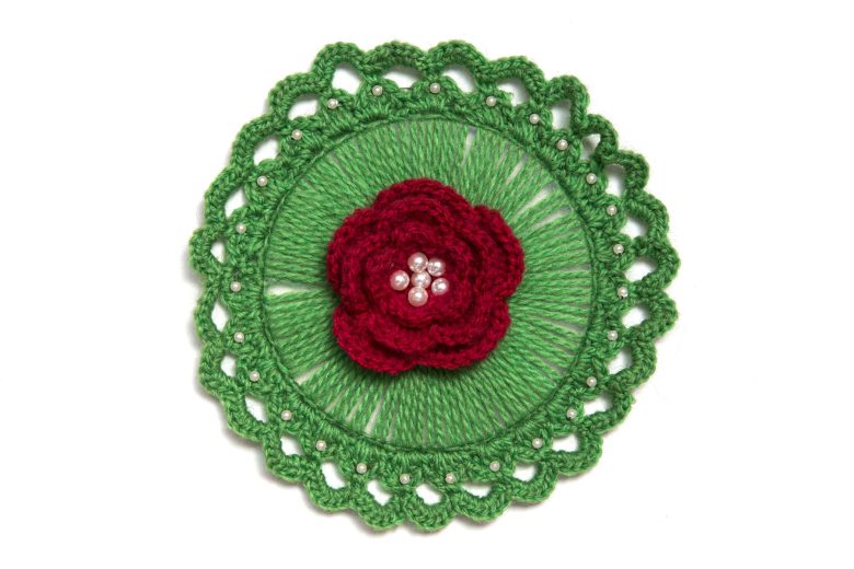 red and green crocheted mat