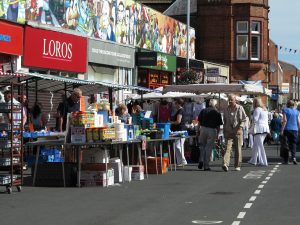 View of market stalls in front of the loros store