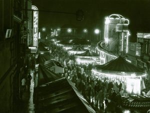 Black and white photo of a view from above of Loughborough fair at night