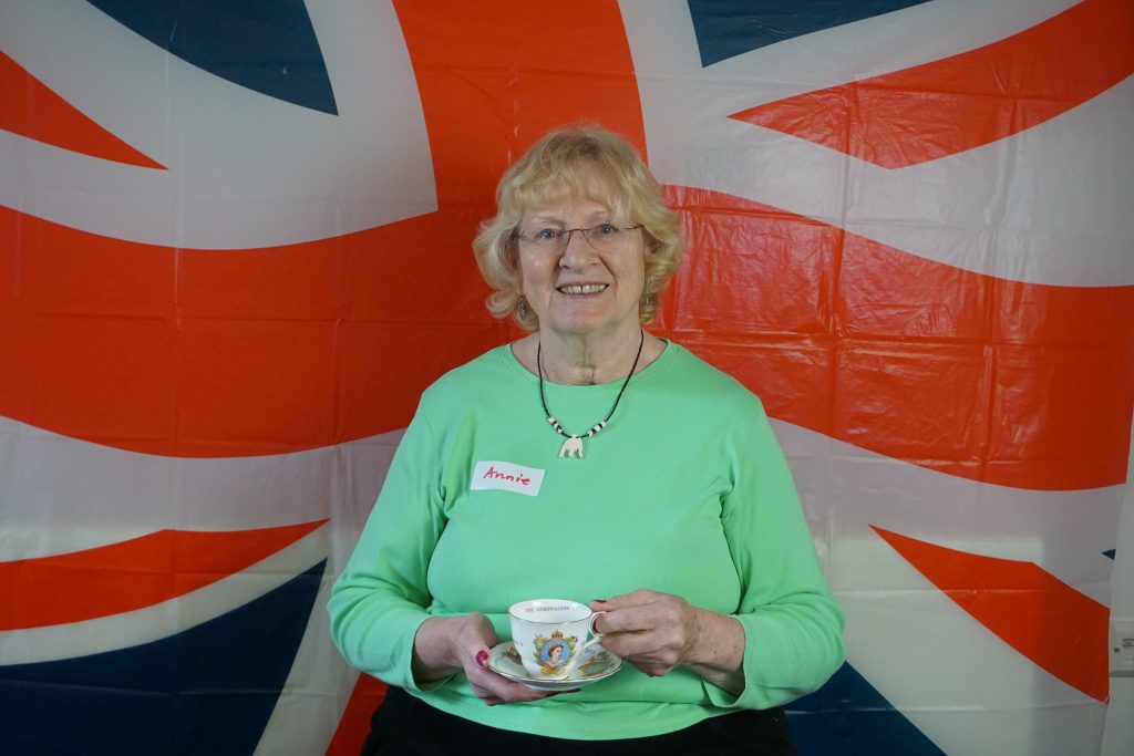 Annie holding coronation teacup