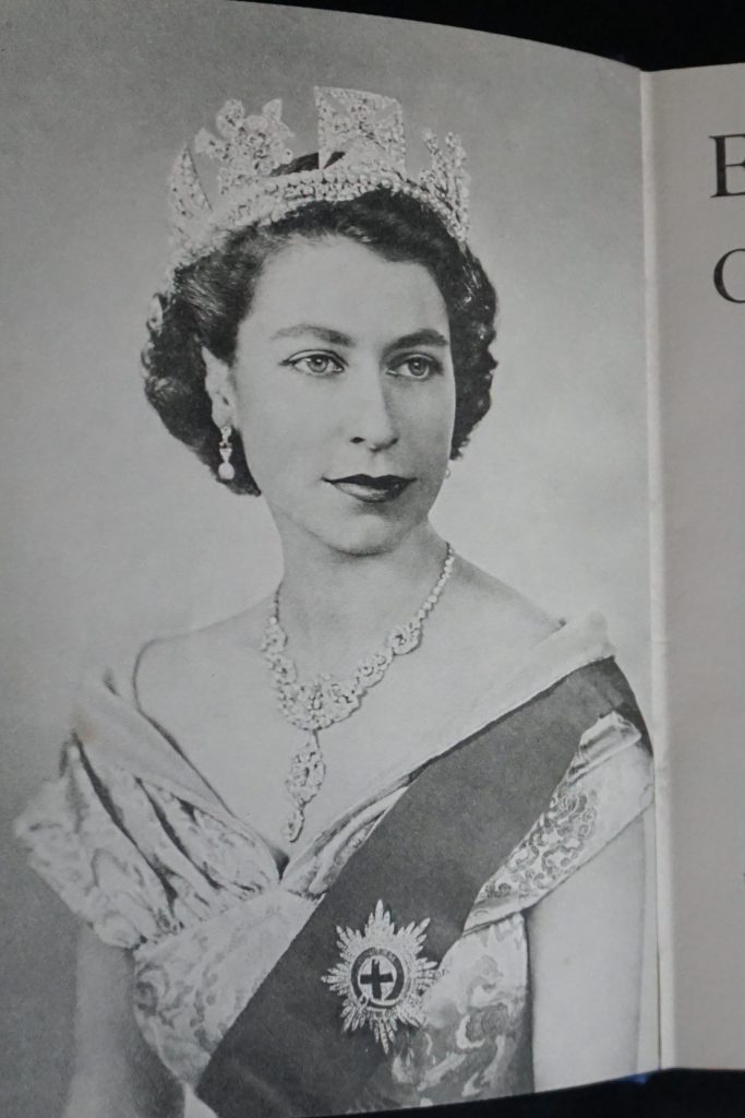 Image of young Queen Elizabeth inside Coronation book