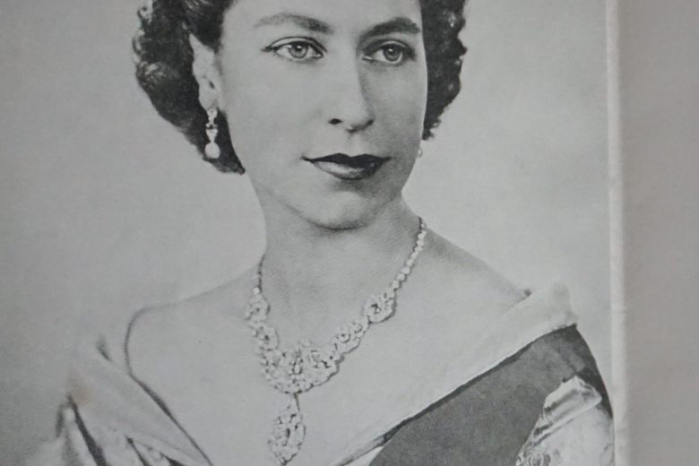 Image of young Queen Elizabeth inside Coronation book