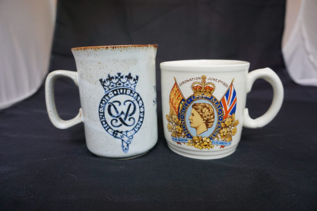 1 Silver Jubilee mug and 1 Queen Elizabeth coronation mug