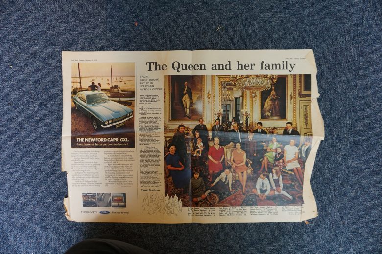 Old newspaper clipping of the Queen and her family