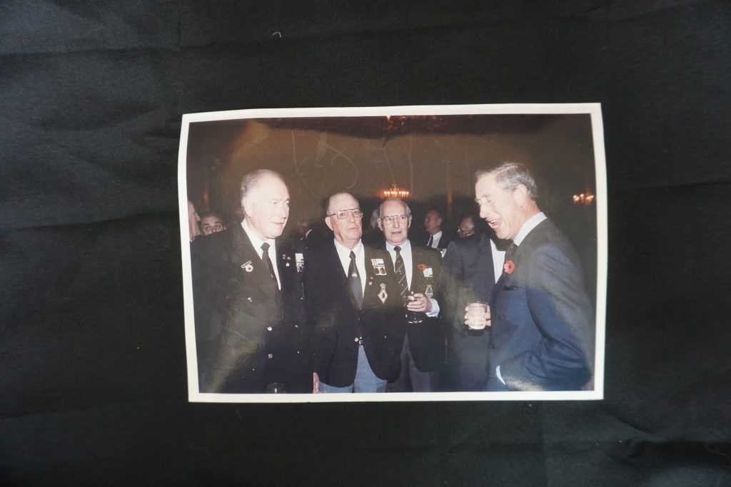 Photo of Prince Charles with Valerie's husband John and two other men
