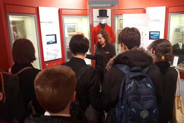 Students being given a tour of Melton Carnegie Museum during their volunteer induction. Photograph taken in the hunting gallery.