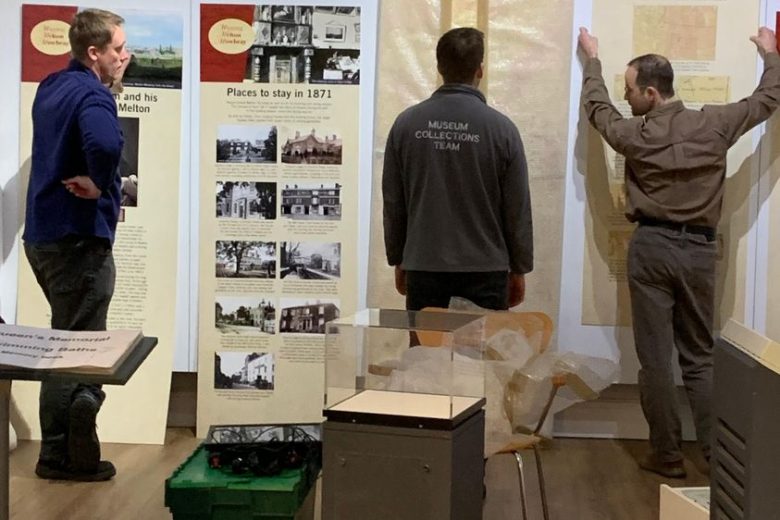 Museum Team installing Mapping Melton exhibition.